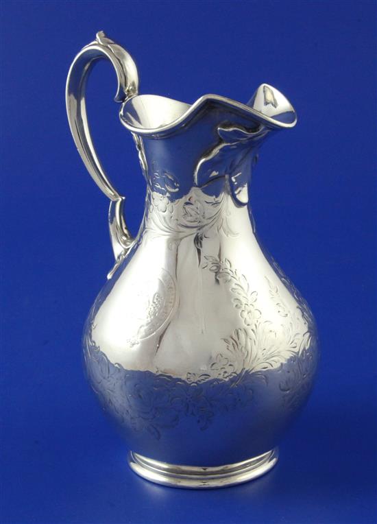 A Victorian silver baluster cream jug by Edward & John Barnard, 7.5 oz.